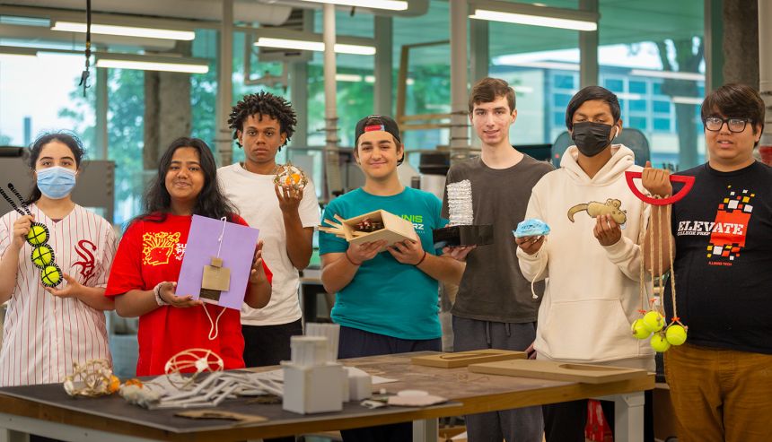 Participants in the Rapid Pet Prototyping summer program show off their prototypes in July 2023