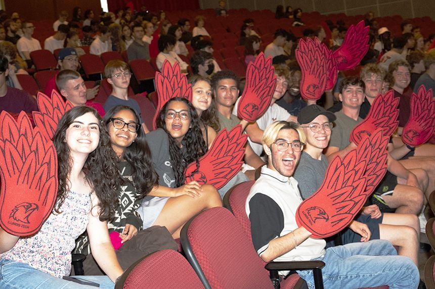 Illinois Tech students post during Convocation