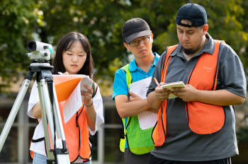 Illinois Tech students practice surveying on Mies Campus