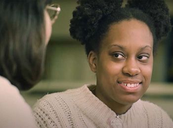 Marilyn Flowers talks with a peer Illinois Tech student