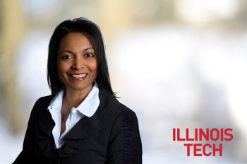 Indira Saladi smiles against a blurred background with the Illinois Tech logo in the bottom right