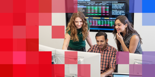 Two female and one male Illinois Tech Stuart Business School MBA students gathered around computer screen with pixel treatment overlayed